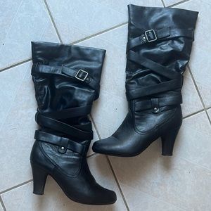 Woman’s under the knee boots.